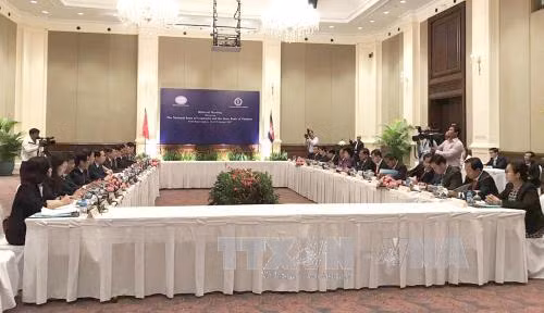 Le Vietnam et le Cambodge renforcent leur coopération bancaire ảnh 1