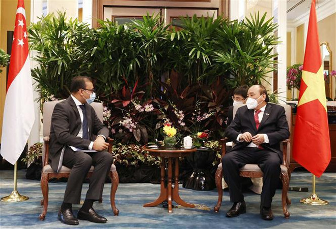 Le président Nguyen Xuan Phuc rencontre des entreprises singapouriennes ảnh 6