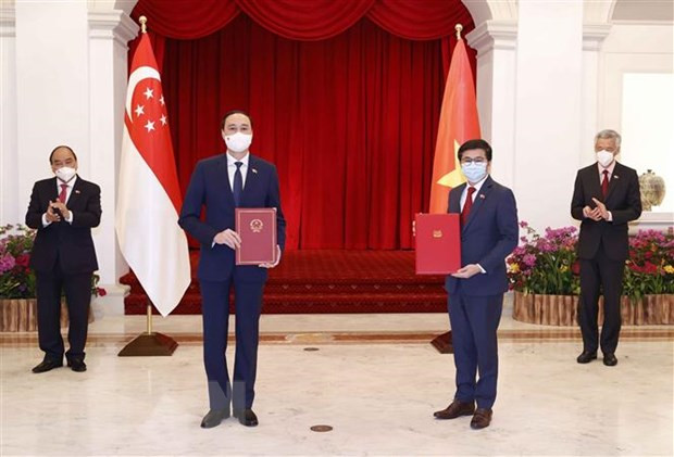 Le Front de la Patrie du Vietnam et l’Association du peuple de Singapour boostent leur coopération ảnh 1 Le Front de la Patrie du Vietnam et l’Association du peuple de Singapour boostent leur coopération ảnh 1