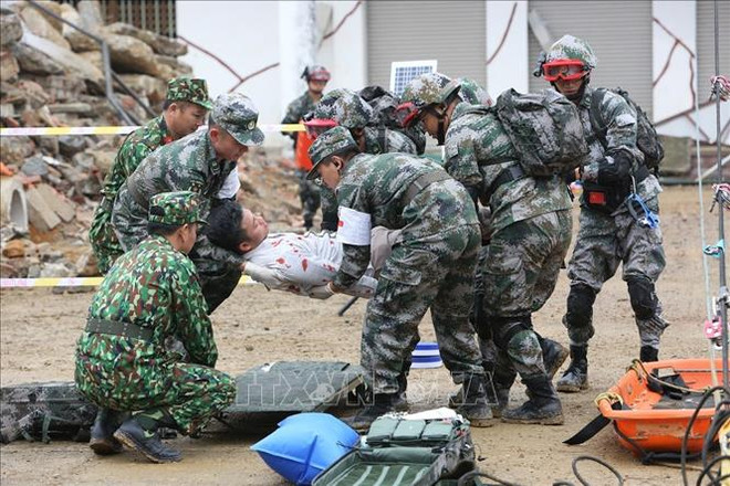 Coopération entre les armées et les populations de la région frontalière Phuc Hoa et Longzhou ảnh 1 Coopération entre les armées et les populations de la région frontalière Phuc Hoa et Longzhou ảnh 1