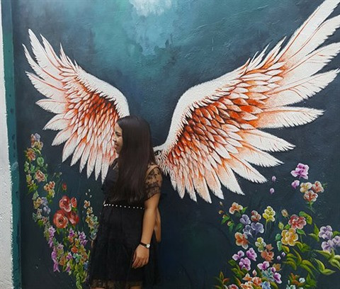 Dà Nang: des fresques murales en plein cœur de la ville ảnh 8