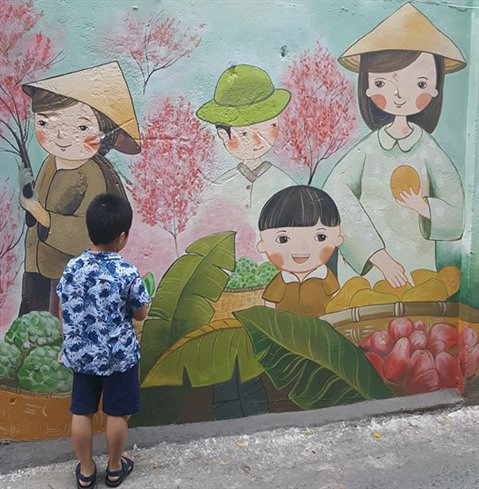 Dà Nang: des fresques murales en plein cœur de la ville ảnh 6