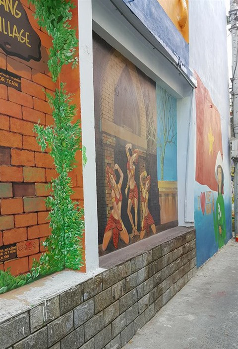 Dà Nang: des fresques murales en plein cœur de la ville ảnh 10