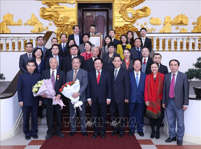 Le vice-PM et ministre des AE Pham Binh Minh reçoit des délégués du Forum populaire Vietnam-Chine ảnh 1 Le vice-PM et ministre des AE Pham Binh Minh reçoit des délégués du Forum populaire Vietnam-Chine ảnh 1