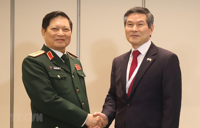 Activités du ministre vietnamien de la Défense au 18e Dialogue de Shangri-La ảnh 1 Activités du ministre vietnamien de la Défense au 18e Dialogue de Shangri-La ảnh 1