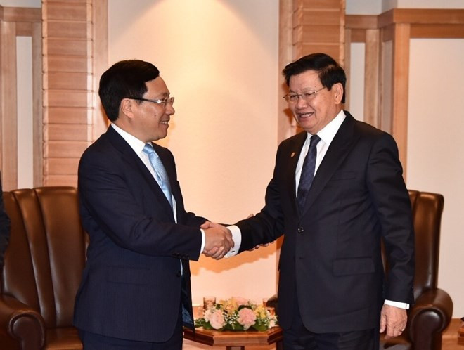 Le vice-PM Pham Binh Minh rencontre des dirigeants japonais et laotien à Tokyo ảnh 2 Le vice-PM Pham Binh Minh rencontre des dirigeants japonais et laotien à Tokyo ảnh 2