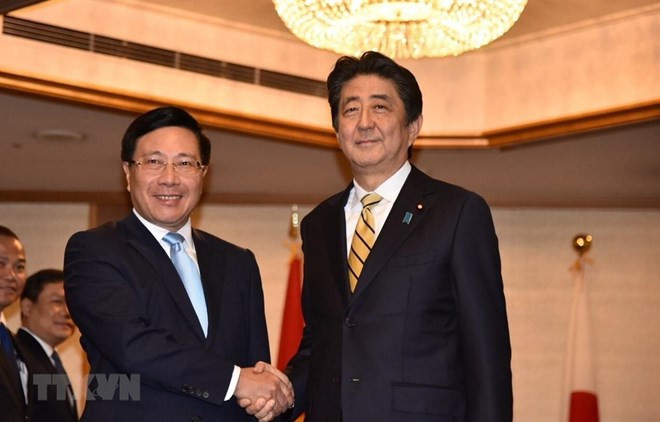 Le vice-PM Pham Binh Minh rencontre des dirigeants japonais et laotien à Tokyo ảnh 1 Le vice-PM Pham Binh Minh rencontre des dirigeants japonais et laotien à Tokyo ảnh 1