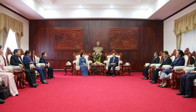 Le Vietnam et le Laos partagent leur expérience sur la mobilisation des masses ảnh 1 Le Vietnam et le Laos partagent leur expérience sur la mobilisation des masses ảnh 1