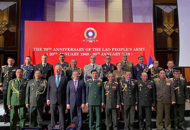Cérémonie de célébration des 70 ans de la fondation de l’Armée populaire du Laos ảnh 1