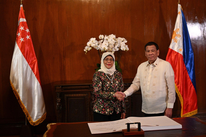 Renforcement de la coopération dans la défense et l’économie Philippines - Singapour ảnh 1