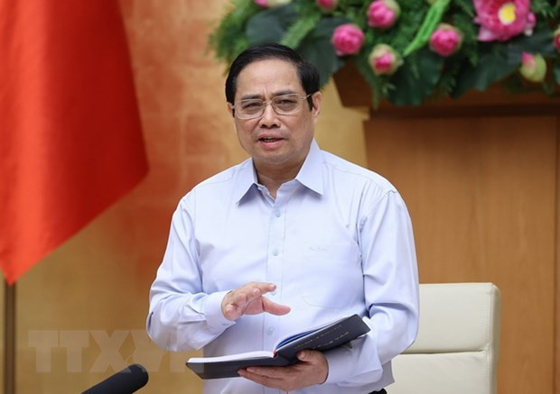 Le Premier ministre Pham Minh Chinh appelle à s’unir pour vaincre l’épidémie de Covid-19 ảnh 1 Le Premier ministre Pham Minh Chinh appelle à s’unir pour vaincre l’épidémie de Covid-19 ảnh 1