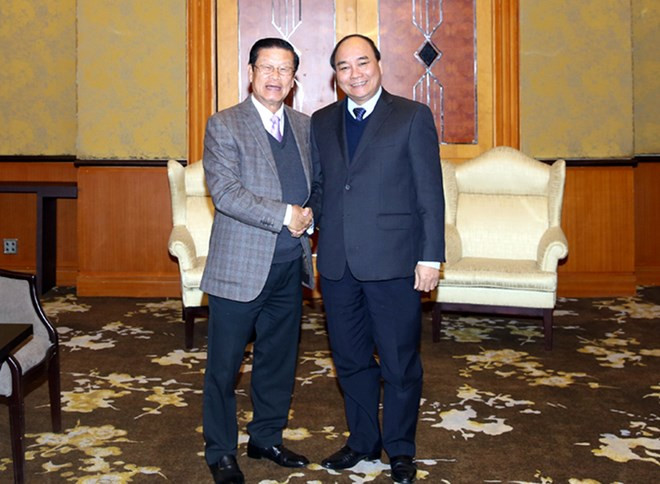 Vietnam-Laos : entretien entre les deux vice-Premiers ministres ảnh 1 Vietnam-Laos : entretien entre les deux vice-Premiers ministres ảnh 1