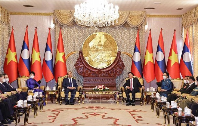 La visite au Laos du président vietnamien ''enregistre des résultats complets et substantiels'' ảnh 1 La visite au Laos du président vietnamien ''enregistre des résultats complets et substantiels'' ảnh 1