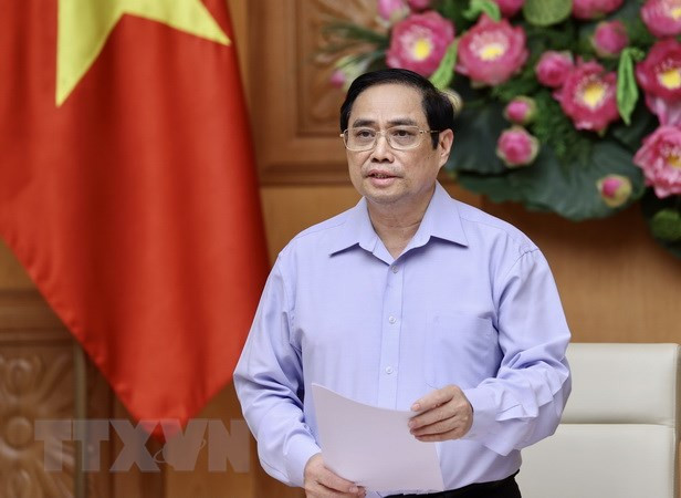 Le PM encourage les gens à être plus actifs dans le combat contre le coronavirus ảnh 1