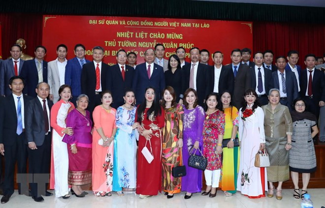 Les PM vietnamien et laotien à la célébration du Têt traditionnel à Vientiane ảnh 1 Les PM vietnamien et laotien à la célébration du Têt traditionnel à Vientiane ảnh 1