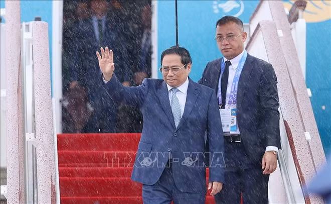 Le PM entame sa participation à la CAEXPO et au CABIS en Chine ảnh 2