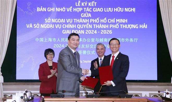 Signature d’un protocole d’accord de coopération entre Ho Chi Minh-Ville et Shanghai ảnh 1