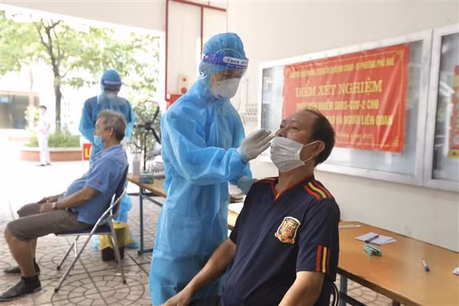 Coronavirus : le Vietnam et la Chine échangent leurs expériences ảnh 2
