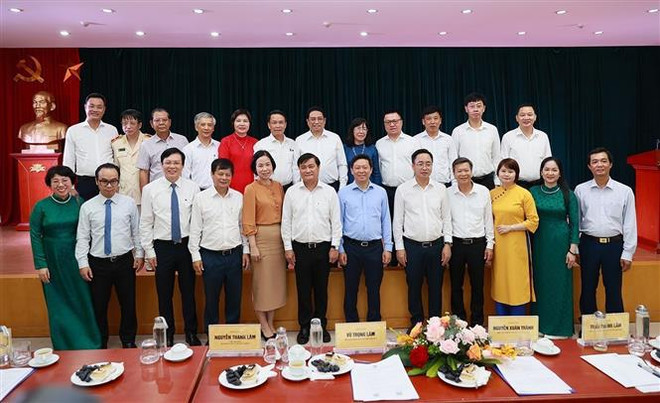 Le Premier ministre Pham Minh Chinh travaille avec l’Association des journalistes ảnh 2