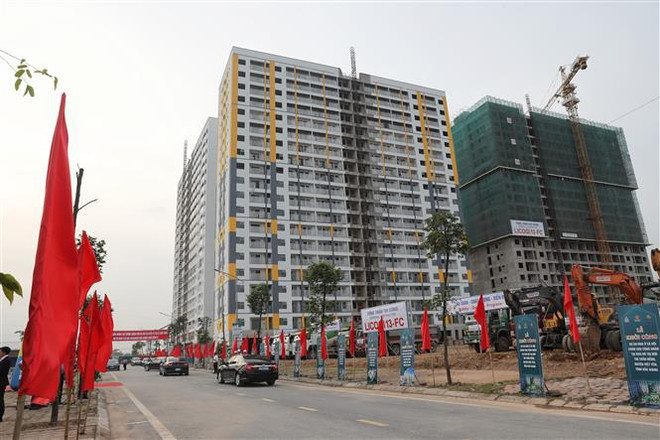 Le PM Pham Minh Chinh inaugure un pont et lance un projet de logement social à Bac Giang ảnh 2 Le PM Pham Minh Chinh inaugure un pont et lance un projet de logement social à Bac Giang ảnh 2