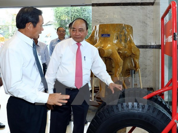 Le chef du gouvernement travaille avec le Groupe de caoutchouc du Vietnam ảnh 2 Le chef du gouvernement travaille avec le Groupe de caoutchouc du Vietnam ảnh 2