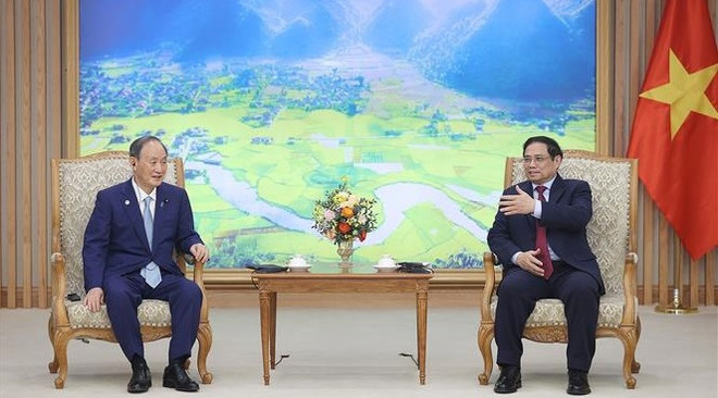 Le Premier ministre Pham Minh Chinh reçoit l'ancien Premier ministre japonais Suga Yoshihide ảnh 2 Le Premier ministre Pham Minh Chinh reçoit l'ancien Premier ministre japonais Suga Yoshihide ảnh 2