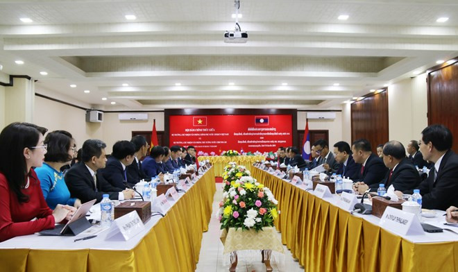 Les bureaux des gouvernements vietnamien et lao cultivent leurs liens ảnh 1 Les bureaux des gouvernements vietnamien et lao cultivent leurs liens ảnh 1