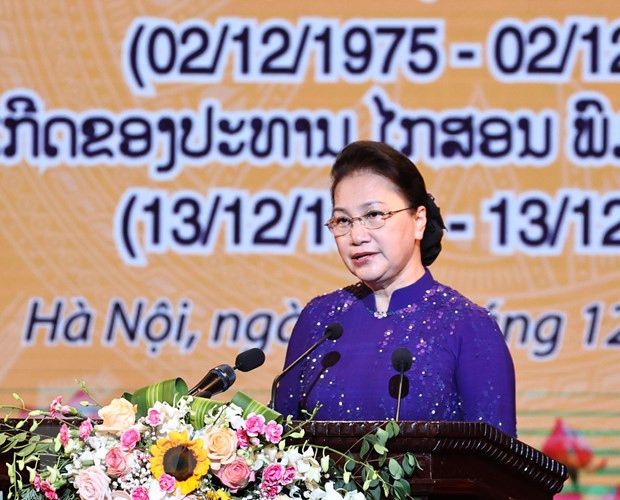 Une cérémonie solennelle en l’honneur de la Fête nationale du Laos ảnh 1 Une cérémonie solennelle en l’honneur de la Fête nationale du Laos ảnh 1