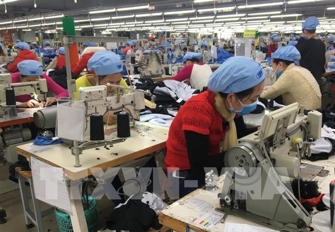 Un journal allemand fait grand cas des efforts du Vietnam face à la crise économique ảnh 1 Un journal allemand fait grand cas des efforts du Vietnam face à la crise économique ảnh 1