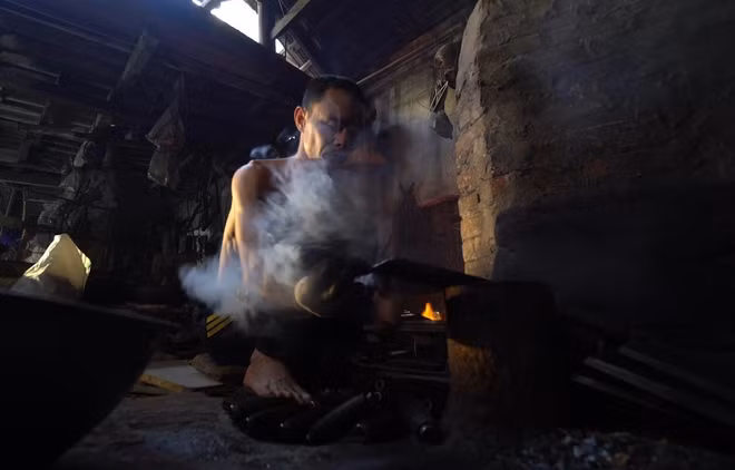 Le village des forgerons de Da Sy ảnh 1