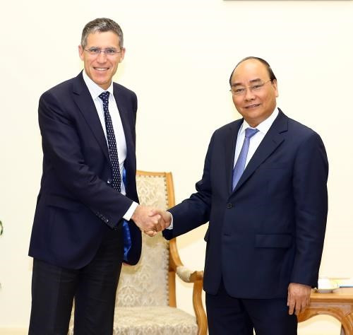 Le Premier ministre rencontre des chefs de groupes français et australien ảnh 1 Le Premier ministre rencontre des chefs de groupes français et australien ảnh 1