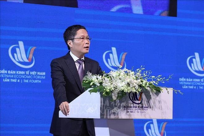 Le PM assiste au 4e Forum économique du Vietnam ảnh 2 Le PM assiste au 4e Forum économique du Vietnam ảnh 2