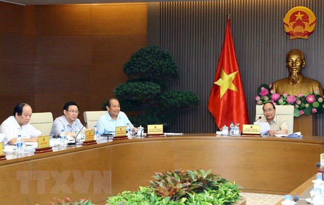 La permanence du gouvernement discute de la situation socioéconomique ảnh 1