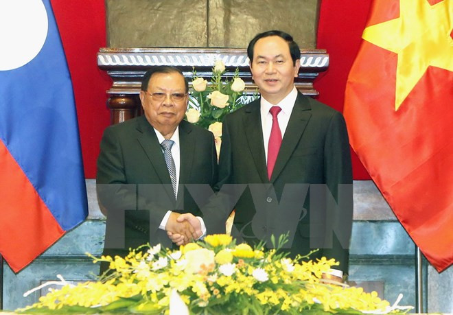 La presse laotienne salue la visite officielle de Bounnhang Vorachit au Vietnam ảnh 1 La presse laotienne salue la visite officielle de Bounnhang Vorachit au Vietnam ảnh 1