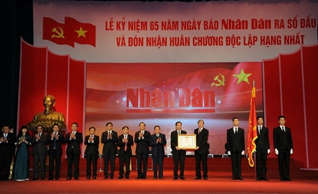 Célébration du 65e anniversaire du Journal "Nhân Dân" ảnh 1