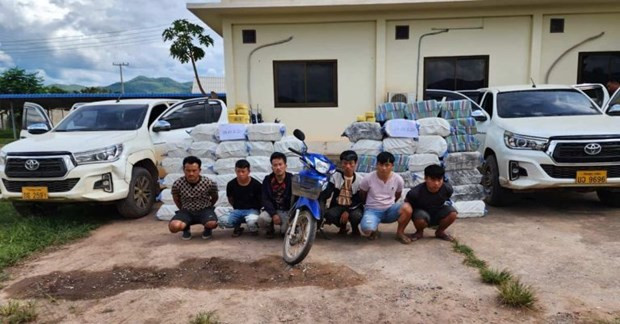 La police lao saisit 12 millions de comprimés de méthamphétamine et arrête six personnes ảnh 1