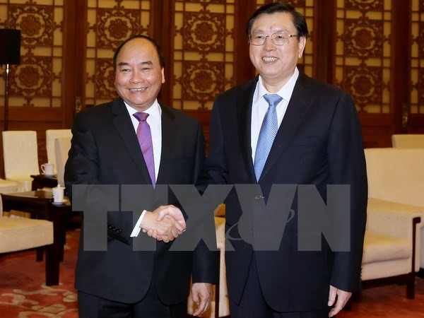 Activités du Premier ministre Nguyen Xuan Phuc à Pékin ảnh 1 Activités du Premier ministre Nguyen Xuan Phuc à Pékin ảnh 1