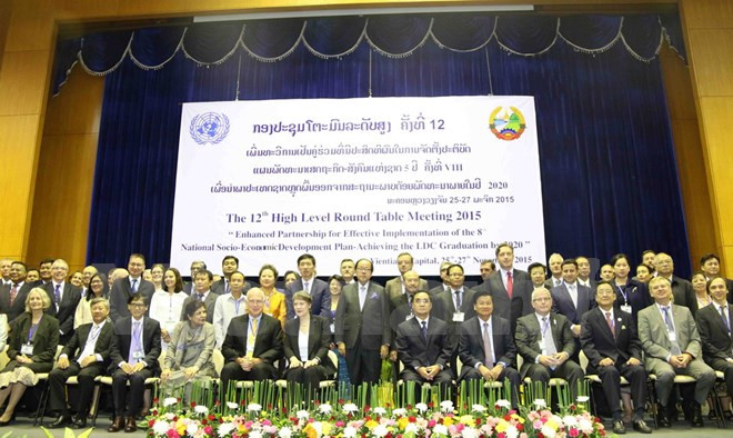 Le Laos ouvre sa 12e table ronde axée sur le développement socioéconomique ảnh 1 Le Laos ouvre sa 12e table ronde axée sur le développement socioéconomique ảnh 1