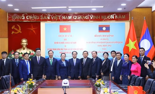 Vietnam-Laos: échange d’expériences sur la gestion des affaires religieuses ảnh 2