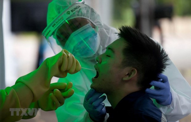 L'Indonésie signale 973 nouveaux cas de COVID-19, le plus grand saut quotidien ảnh 1