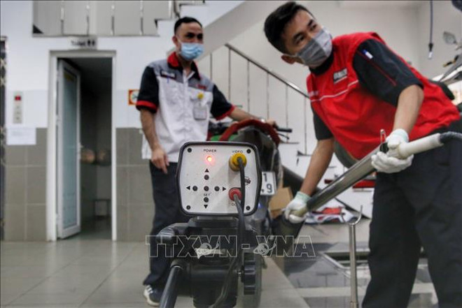 Hanoï établit une feuille de route pour le contrôle des émissions d'échappement des motos ảnh 2