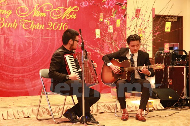 Les Vietnamiens à l'étranger accueillent le Têt traditionnel du Singe ảnh 1 Les Vietnamiens à l'étranger accueillent le Têt traditionnel du Singe ảnh 1