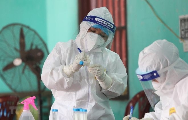 COVID-19: 21 nouveaux cas détectés dans des zones de confinement ảnh 1