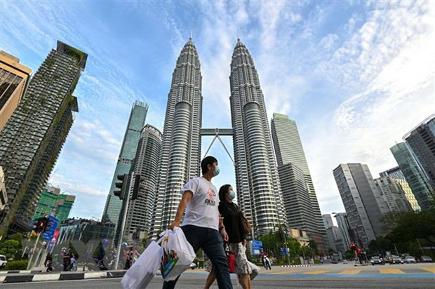 COVID-19: des milliers de nouveaux cas détectés en Indonésie et en Malaisie ảnh 1