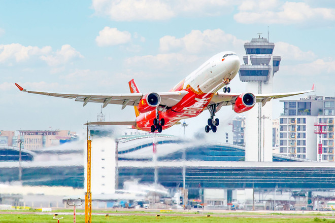 Vietjet propose des billets à 0 dôngs et 10 % de réduction sur les billets Business ảnh 1