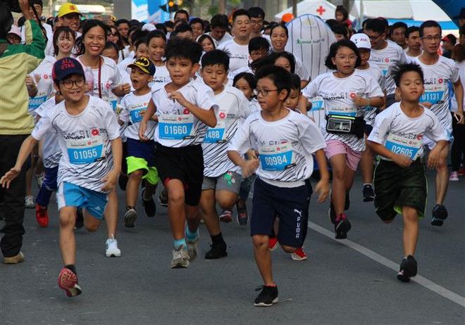 Plus de 9.000 coureurs au marathon de Ho Chi Minh-Ville 2019 ảnh 1 Plus de 9.000 coureurs au marathon de Ho Chi Minh-Ville 2019 ảnh 1