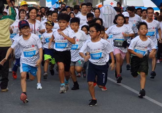 Plus de 9.000 coureurs au marathon de Ho Chi Minh-Ville 2019 ​ ảnh 1