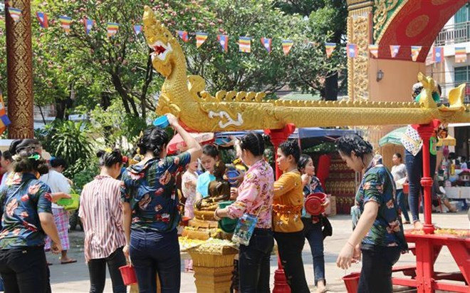 La fête du Nouvel An traditionnel bat son plein au Laos ảnh 1 La fête du Nouvel An traditionnel bat son plein au Laos ảnh 1