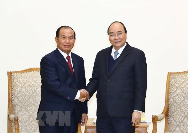 Le Premier ministre reçoit le ministre laotien de la Justice ảnh 1 Le Premier ministre reçoit le ministre laotien de la Justice ảnh 1