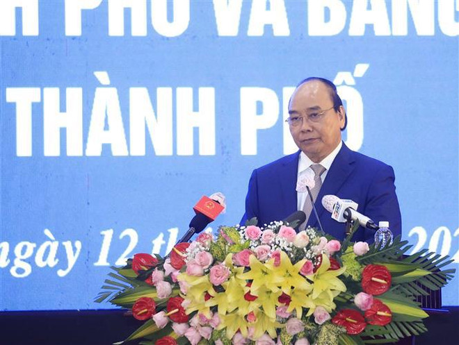 Le président remet l’Ordre du travail au district de Cu Chi à Ho Chi Minh-Ville ảnh 1 Le président remet l’Ordre du travail au district de Cu Chi à Ho Chi Minh-Ville ảnh 1